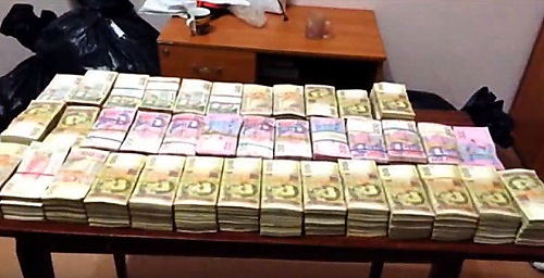 Свежие новости: В Николаеве пограничники и налоговики изъяли на складе крупную партию товара и миллион гривен наличными