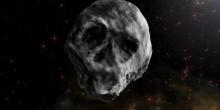 Фото новости: К Земле приближается огромный черный астероид в форме черепа Свежие новости: К Земле приближается огромный черный астероид в форме черепа
